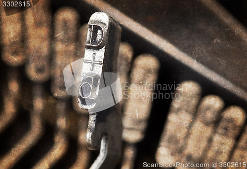 Image of D hammer - old manual typewriter - warm filter