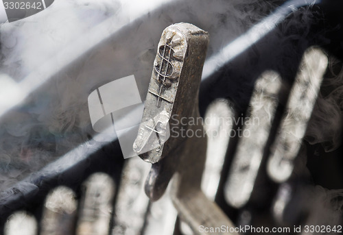 Image of Dollar and florijn hammer - old manual typewriter - mystery smok