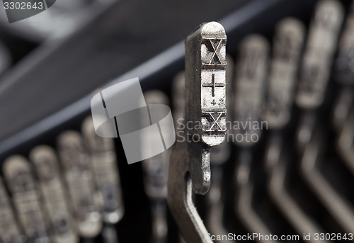 Image of X hammer - old manual typewriter