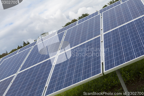 Image of Field with blue siliciom solar cells alternative energy