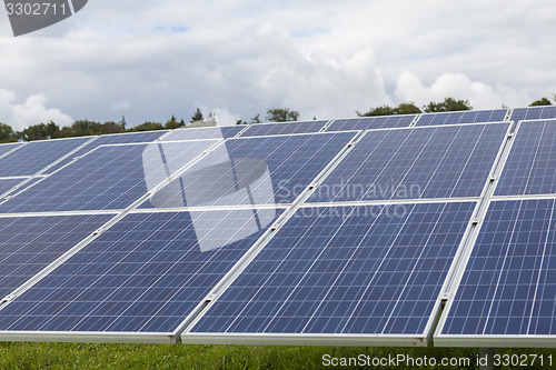 Image of Field with blue siliciom solar cells alternative energy