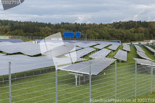 Image of Field with blue siliciom solar cells alternative energy