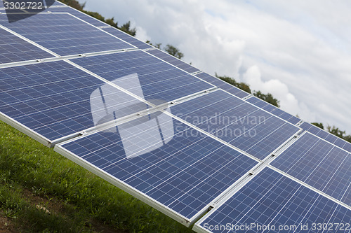 Image of Field with blue siliciom solar cells alternative energy