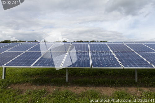 Image of Field with blue siliciom solar cells alternative energy