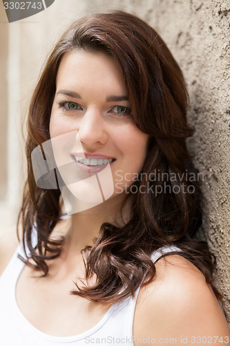 Image of Portrait beautiful woman with dark hair smiling in the camera