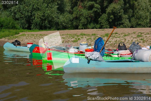 Image of Canoes on the Riverside