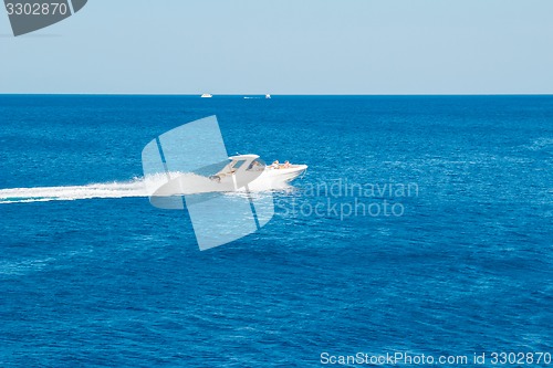 Image of Powerboat racing at high speed in the Red Sea
