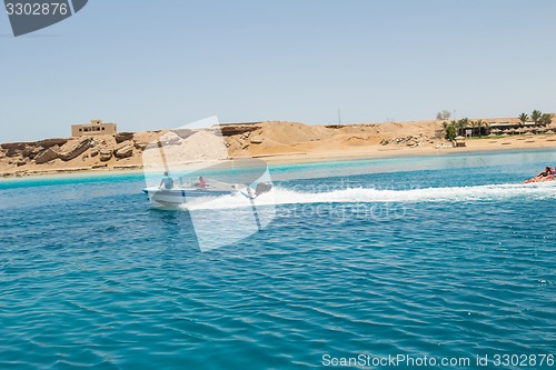 Image of Powerboat racing at high speed in the Red Sea