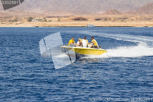 Image of Powerboat racing at high speed in the Red Sea