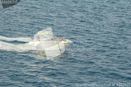 Image of Powerboat racing at high speed in the Red Sea