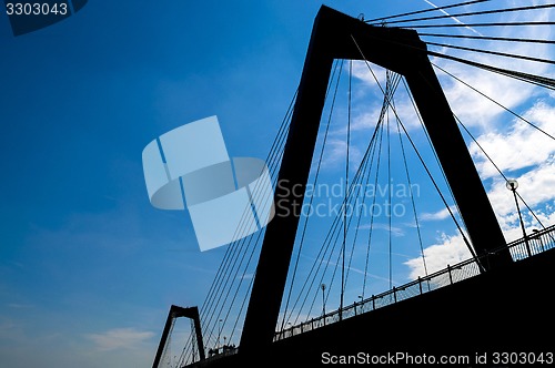 Image of Rotterdam bridge silhouette in blue sky