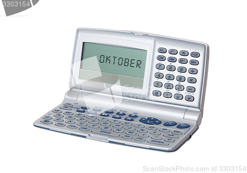 Image of Electronic personal organiser isolated - Oktober