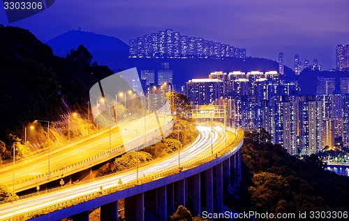 Image of highway traffic road to city downtown