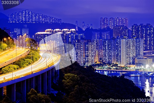 Image of highway traffic road to city downtown