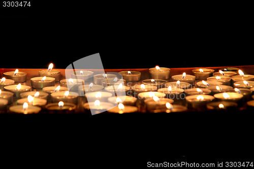 Image of candles in the dark night