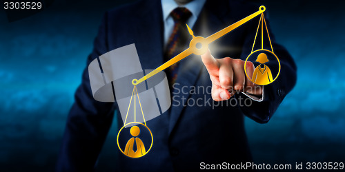 Image of Male Worker Outbalancing A Female White Collar 