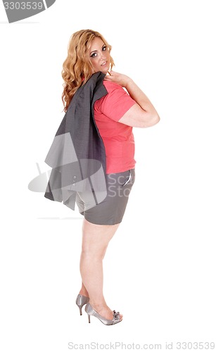 Image of Blond plus size woman in shorts.