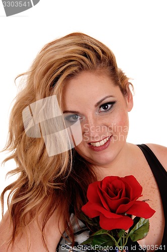 Image of Blond woman with red rose.