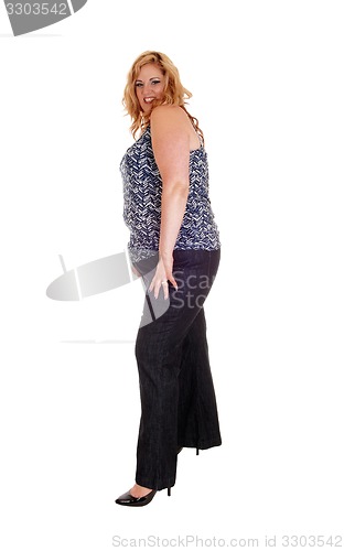 Image of Plus size woman in jeans.