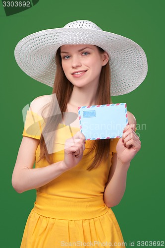 Image of Woman with blank envelope