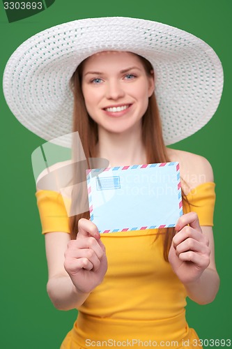 Image of Woman with blank envelope