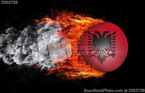 Image of Flag with a trail of fire and smoke - Albania