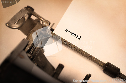 Image of Old typewriter with paper