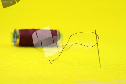 Image of needle with string