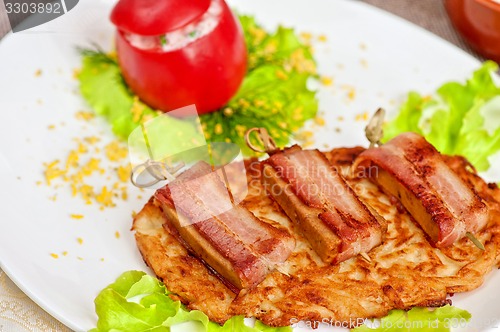 Image of veal meat with bacon