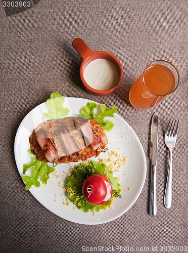 Image of veal meat with bacon