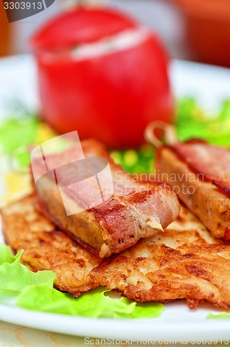Image of veal meat with bacon