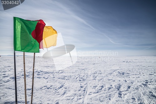 Image of Flags on the background of winter sky