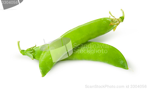 Image of Two of fresh green peas sugar in the pods
