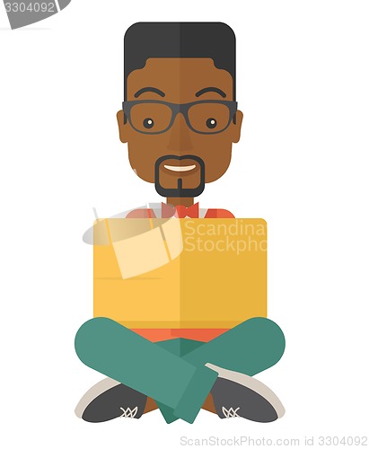 Image of Black guy reading a book