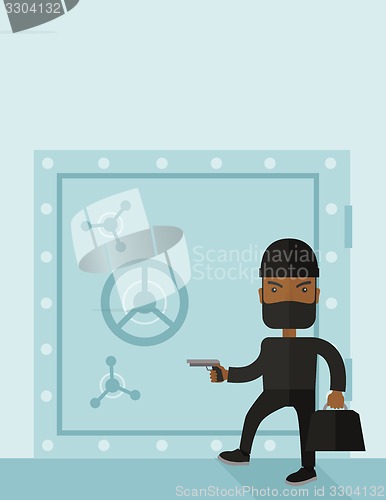 Image of Man in black hacking bank safe.