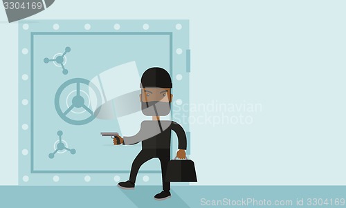 Image of Man in black hacking bank safe.