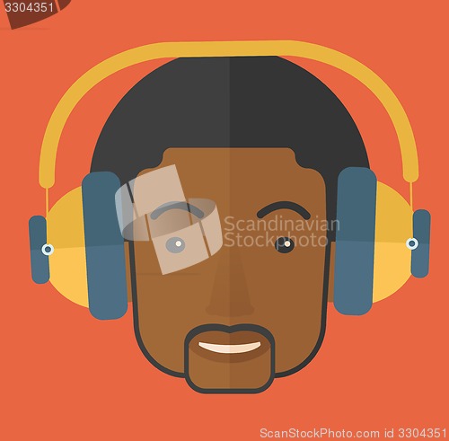 Image of Black young guy with headphone.