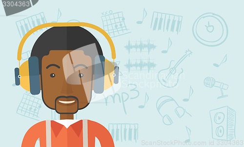 Image of Black young guy with headphone.