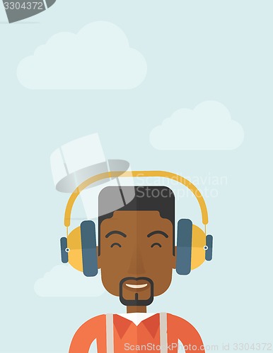 Image of Black young guy with headphone.