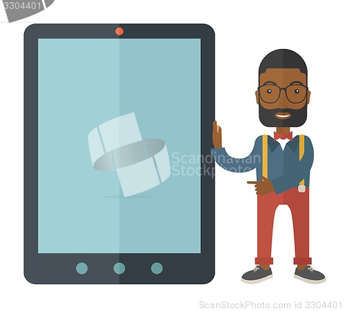 Image of Black businessman holding a big screen tablet.