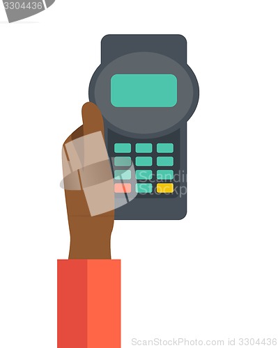 Image of Holding credit card machine