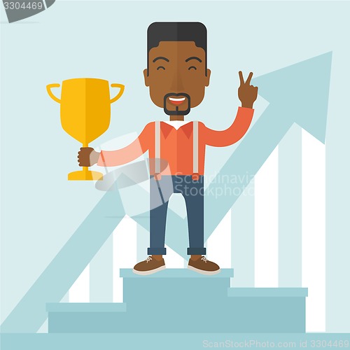 Image of African businessman on winning podium