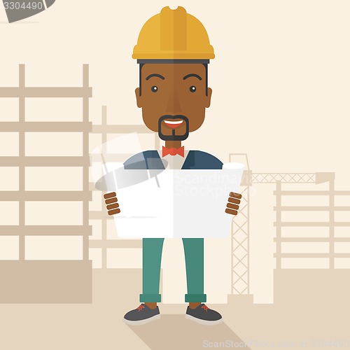 Image of African-american Construction worker holding the plan.