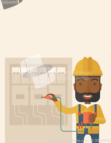 Image of Black electrician repairing an electrical panel