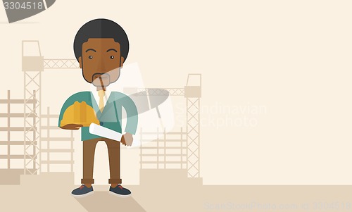 Image of Young african construction worker holding hard hat and blueprint.