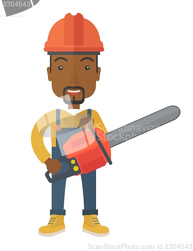 Image of Black Lumberjack cuts a tree by chainsaw.