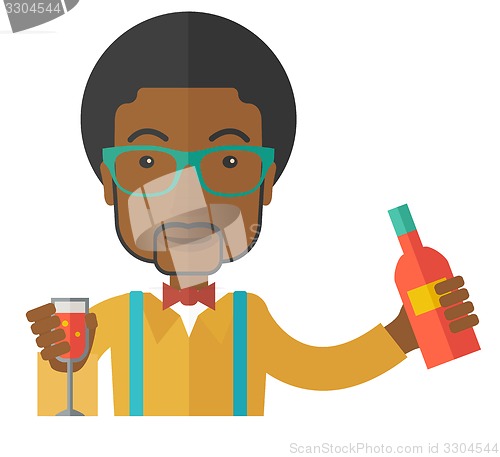 Image of African bartender at the bar holding a drinks.