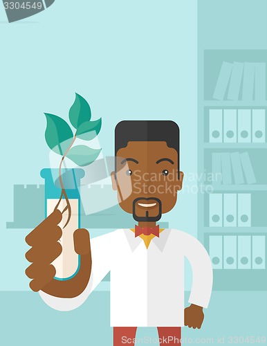 Image of Black guy Chemist with tube and eco leaves.