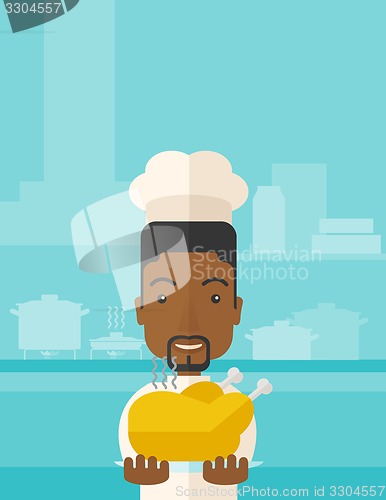 Image of Chef presenting a tasty cooked turkey.
