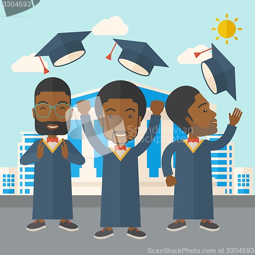 Image of Three men throwing graduation cap.